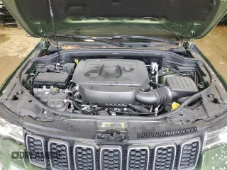 2021 Jeep Grand Cherokee Trailhawk with VIN 1C4RJFLG7MC766876, listed as a Copart auction lot 57228665 with 50,398 mi miles and Salvage title. Bid and sale history available at DreamBid. Image 12.