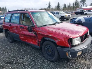 1999 Subaru Forester L with VIN JF1SF6357XH748358, listed as a IAAI auction lot 41885337 with 201,441 mi miles. Bid and sale history available at carsss.com. Image 6.