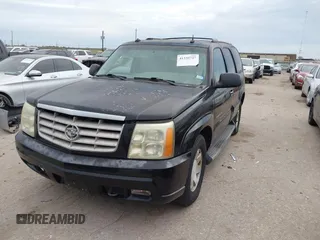 2003 Cadillac Escalade z VIN 1GYEC63T43R206146, wystawiony jako IAAI lot #41335727 z przebiegiem Nie podano mil oraz . Historia ofert i sprzedaży dostępna na DreamBid. Obrazek 2.