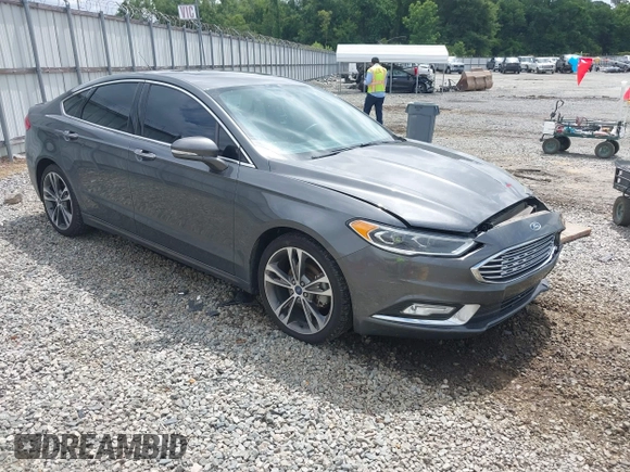 2017 Ford Fusion Titanium with VIN 3FA6P0K98HR363360, listed as a IAAI auction lot 42461432 with 182,807 mi miles and . Bid and sale history available at DreamBid. Image 1.