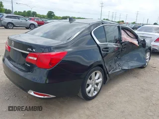 2014 Acura RLX with VIN JH4KC1F36EC002427, listed as a IAAI auction lot 42099583 with 114,671 mi miles. Bid and sale history available at carsss.com. Image 4.