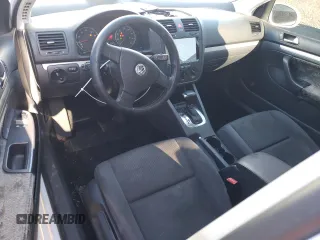 2009 Volkswagen Rabbit S with VIN WVWBB71KX9W020617, listed as a Copart auction lot 82935024 with 133,760 mi miles and Salvage Title. Bid and sale history available at carsss.com. Image 8.