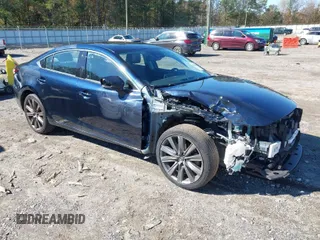 2021 Mazda 6 Grand Touring with VIN JM1GL1TY3M1617566, listed as a IAAI auction lot 40880436 with 99,804 mi miles. Bid and sale history available at carsss.com. Image 1.