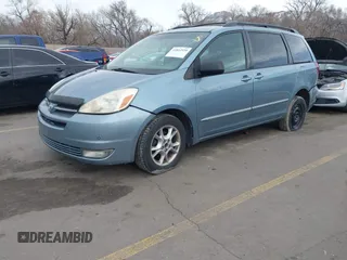 2005 Toyota Sienna XLE with VIN 5TDBA22CX5S039921, listed as a IAAI auction lot 41812339 with 245,111 mi miles and . Bid and sale history available at DreamBid. Image 2.