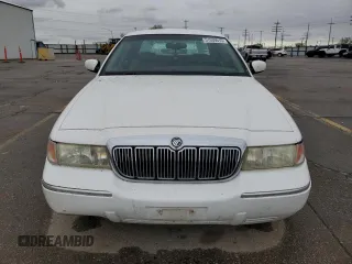 1999 Mercury Grand Marquis LS с VIN 2MEFM75W6XX619412, выставлен на аукционе Copart как лот 51939515 с пробегом 131 784 миль миль и Списание • Salvage title. История ставок и продаж доступна на DreamBid. Изображение 5.