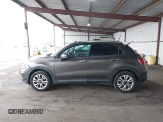 2016 FIAT 500X Easy z VIN ZFBCFXBTXGP349005, wystawiony jako IAAI lot #41163593 z przebiegiem 69 012 mil mil oraz . Historia ofert i sprzedaży dostępna na DreamBid. Obrazek 14.