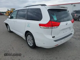 2011 Toyota Sienna XLE AAS with VIN 5TDYK3DC3BS161414, listed as a IAAI auction lot 41124705 with 167,364 mi miles. Bid and sale history available at carsss.com. Image 3.