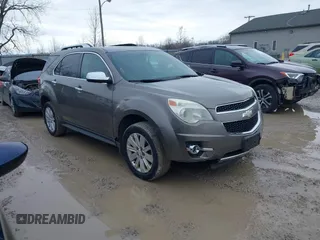 2011 Chevrolet Equinox LTZ z VIN 2CNFLGE56B6423945, wystawiony jako IAAI lot #41524820 z przebiegiem 189 180 mil mil oraz . Historia ofert i sprzedaży dostępna na DreamBid. Obrazek 1.