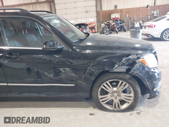 2015 Mercedes-Benz GLK with VIN WDCGG8JB0FG364079, listed as a IAAI auction lot 42096003 with 113,571 mi miles. Bid and sale history available at carsss.com. Image 17.