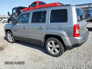 2015 Jeep Patriot Latitude with VIN 1C4NJPFB1FD157025, listed as a Copart auction lot 52310155 with 132,752 mi miles and Salvage title. Bid and sale history available at DreamBid. Image 2.
