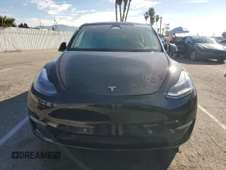 2024 Tesla Model Y Long Range z VIN 7SAYGAEE2RF075681, wystawiony jako Copart lot #86433524 z przebiegiem 18 640 mil mil oraz Szkoda całkowita • Salvage title. Historia ofert i sprzedaży dostępna na DreamBid. Obrazek 5.