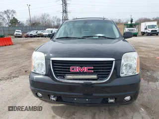 2013 GMC Yukon SLT with VIN 1GKS2CE01DR135135, listed as a IAAI auction lot 41828474 with 180,347 mi miles. Bid and sale history available at carsss.com. Image 12.