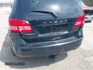2018 Dodge Journey SE with VIN 3C4PDCAB7JT529454, listed as a IAAI auction lot 42066676 with 89,404 mi miles and . Bid and sale history available at carsss.com. Image 6.