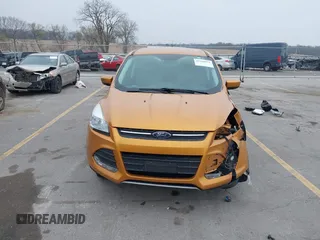 2016 Ford Escape SE z VIN 1FMCU9GX1GUC59233, wystawiony jako IAAI lot #41958573 z przebiegiem 133 223 mil mil oraz . Historia ofert i sprzedaży dostępna na DreamBid. Obrazek 6.