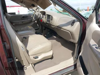 2000 Ford F-150 XL with VIN 1FTRX18L2YNB87229, listed as a IAAI auction lot 42041368 with 84,956 mi miles. Bid and sale history available at carsss.com. Image 5.