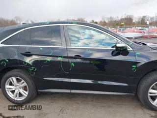 2014 Acura RDX Technology with VIN 5J8TB4H50EL006564, listed as a IAAI auction lot 40945183 with 110,665 mi miles and . Bid and sale history available at DreamBid. Image 14.