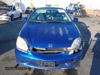 2002 Honda Insight z VIN JHMZE14722T000006, wystawiony jako IAAI lot #41049894 z przebiegiem 185 989 mil mil oraz . Historia ofert i sprzedaży dostępna na DreamBid. Obrazek 13.