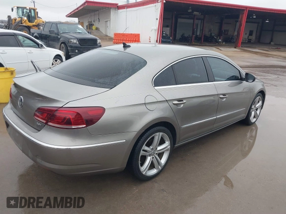 2013 Volkswagen CC Sport with VIN WVWBN7AN5DE514299, listed as a IAAI auction lot 41563521 with 199,249 mi miles. Bid and sale history available at carsss.com. Image 4.