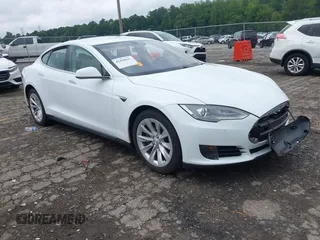 2016 Tesla Model S 70 with VIN 5YJSA1E11GF132984, listed as a IAAI auction lot 42428634 with Not provided miles and . Bid and sale history available at DreamBid. Image 1.