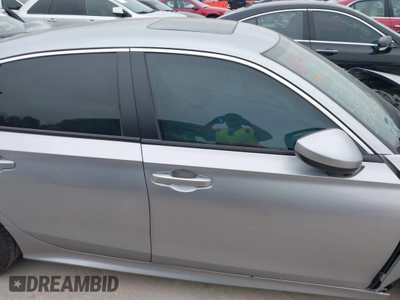 2023 Honda Civic EX with VIN 2HGFE1F77PH321210, listed as a IAAI auction lot 42379950 with Not provided miles and . Bid and sale history available at DreamBid. Image 13.