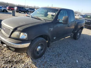 1998 Ford F-150 XL with VIN 1FTRX08L2WKB71914, listed as a Copart auction lot 87251394 with 174,891 mi miles and Salvage title. Bid and sale history available at DreamBid. Image 1.