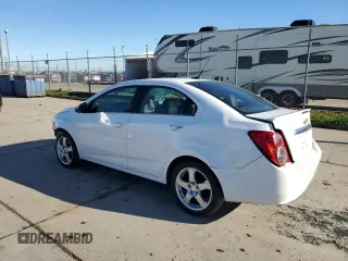 2014 Chevrolet Sonic LTZ with VIN 1G1JE5SH8E4118134, listed as a Copart auction lot 86915364 with 116,484 mi miles and Salvage Title. Bid and sale history available at carsss.com. Image 2.