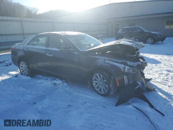 2016 Cadillac CTS AWD with VIN 1G6AW5SXXG0107872, listed as a Copart auction lot 87631955 with 51,624 mi miles and Salvage title. Bid and sale history available at DreamBid. Image 4.