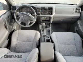 1998 Isuzu Rodeo S z VIN 4S2CK58W0W4339022, wystawiony jako Copart lot #78746864 z przebiegiem 136 138 mil mil oraz Szkoda całkowita • Salvage title. Historia ofert i sprzedaży dostępna na DreamBid. Obrazek 8.