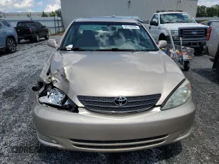 2004 Toyota Camry LE z VIN 4T1BF32K94U571035, wystawiony jako Copart lot #56749935 z przebiegiem 136 361 mil mil oraz Szkoda całkowita • Salvage title. Historia ofert i sprzedaży dostępna na DreamBid. Obrazek 5.