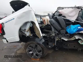 2023 Ford F-150 Lightning Pro with VIN 1FT6W1EV8PWG05765, listed as a IAAI auction lot 41461450 with Not Provided miles and . Bid and sale history available at DreamBid. Image 14.