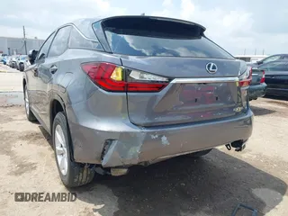 2016 Lexus RX 350 z VIN 2T2ZZMCAXGC031079, wystawiony jako IAAI lot #42120190 z przebiegiem 142 407 mil mil oraz . Historia ofert i sprzedaży dostępna na DreamBid. Obrazek 6.