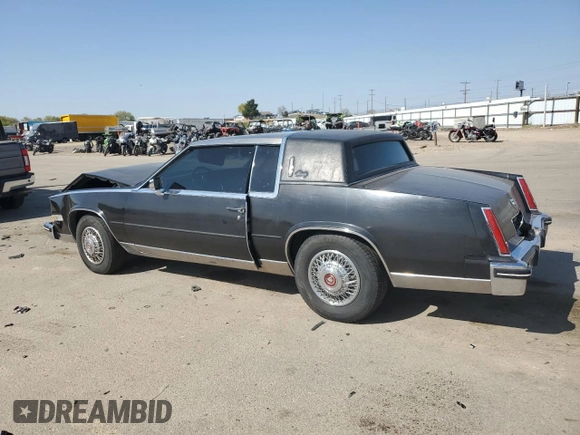 1985 Cadillac Eldorado z VIN 1G6EL5780FE622179, wystawiony jako Copart lot #54109205 z przebiegiem 73 403 mil mil oraz Szkoda całkowita • Salvage title. Historia ofert i sprzedaży dostępna na DreamBid. Obrazek 2.