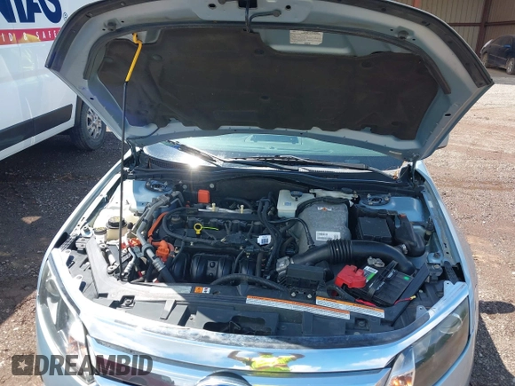 2011 Ford Fusion Hybrid with VIN 3FADP0L37BR264490, listed as a IAAI auction lot 42253495 with 112,866 mi miles and . Bid and sale history available at DreamBid. Image 10.