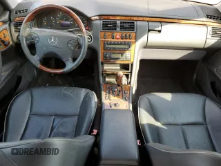 2002 Mercedes-Benz E-Class with VIN WDBJF70J22B489706, listed as a Copart auction lot 71109874 with 59,167 mi miles and Salvage Title. Bid and sale history available at carsss.com. Image 8.