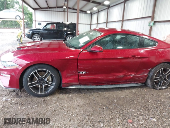 2018 Ford Mustang EcoBoost with VIN 1FA6P8TH7J5101309, listed as a IAAI auction lot 42211115 with 70,661 mi miles and . Bid and sale history available at DreamBid. Image 6.
