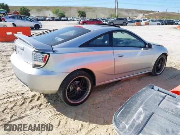 2002 Toyota Celica GT with VIN JTDDR32TX20129902, listed as a IAAI auction lot 41443750 with 203,652 mi miles. Bid and sale history available at carsss.com. Image 4.