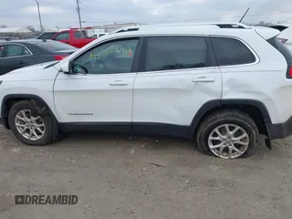 2015 Jeep Cherokee North with VIN 1C4PJMCS6FW564435, listed as a IAAI auction lot 41992440 with 166,048 mi miles. Bid and sale history available at carsss.com. Image 6.