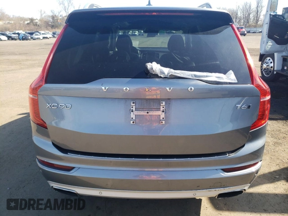 2017 Volvo XC90 Momentum with VIN YV4A22PKXH1106265, listed as a Copart auction lot 52506245 with 94,496 mi miles and Salvage Title. Bid and sale history available at carsss.com. Image 6.