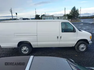 1996 Ford Econoline Cargo with VIN 1FTJS34H4THA69893, listed as a IAAI auction lot 41703257 with 206,503 mi miles and . Bid and sale history available at DreamBid. Image 13.