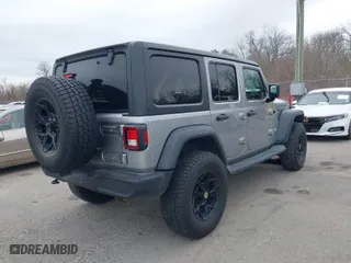 2019 Jeep Wrangler Unlimited Sport with VIN 1C4HJXDG4KW518726, listed as a IAAI auction lot 41597892 with 68,842 mi miles. Bid and sale history available at carsss.com. Image 4.