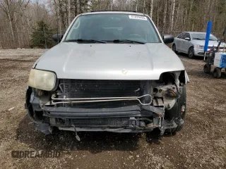 2003 Ford Escape Limited z VIN 1FMCU941X3KC33512, wystawiony jako Copart lot #51029495 z przebiegiem 146 616 mil mil oraz Szkoda całkowita • Salvage title. Historia ofert i sprzedaży dostępna na DreamBid. Obrazek 5.