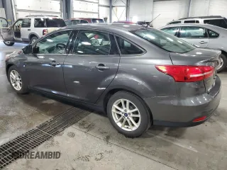 2017 Ford Focus SE with VIN 1FADP3F21HL205754, listed as a Copart auction lot 63632985 with 96,797 mi miles and Salvage title. Bid and sale history available at DreamBid. Image 2.