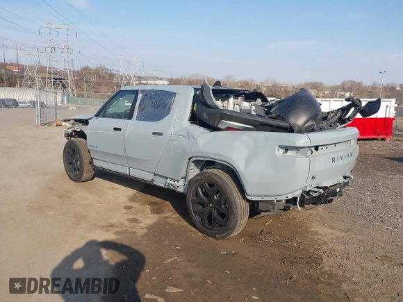 2025 Rivian R1T Adventure z VIN 7FCTGBAAXSN035740, wystawiony jako IAAI lot #41728515 z przebiegiem 3 773 mil mil oraz . Historia ofert i sprzedaży dostępna na DreamBid. Obrazek 3.