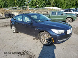 2012 BMW 5 Series GT 550i xDrive with VIN WBASP4C54CC899853, listed as a Copart auction lot 62847714 with 141,034 mi miles and Salvage Title. Bid and sale history available at carsss.com. Image 4.