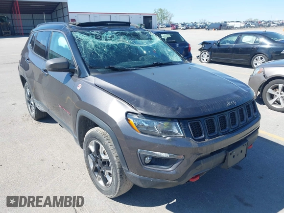 2019 Jeep Compass Trailhawk with VIN 3C4NJDDB0KT619337, listed as a IAAI auction lot 42171160 with 63,869 mi miles and . Bid and sale history available at DreamBid. Image 6.