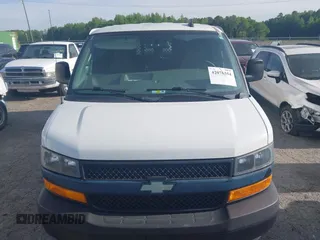 2019 Chevrolet Express Cargo Van with VIN 1GCWGAFP0K1170744, listed as a IAAI auction lot 42076354 with 218,813 mi miles. Bid and sale history available at carsss.com. Image 6.