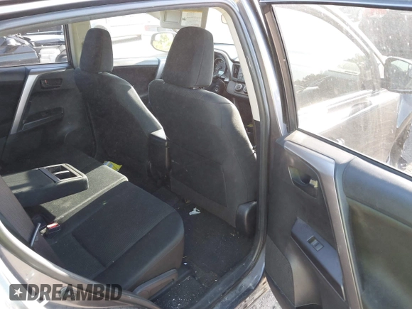 2016 Toyota RAV4 LE with VIN JTMZFREV7GJ065267, listed as a IAAI auction lot 42011267 with 180,127 mi miles. Bid and sale history available at carsss.com. Image 8.