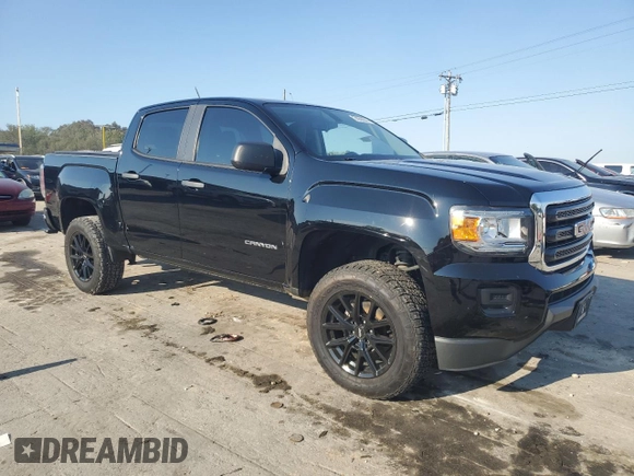 2018 GMC Canyon 2WD with VIN 1GTG5BEN8J1277765, listed as a Copart auction lot 74299244 with 57,042 mi miles and Salvage Title. Bid and sale history available at carsss.com. Image 4.