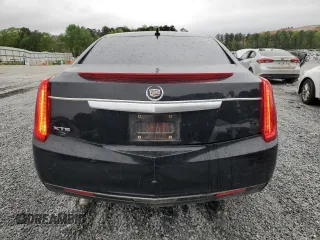 2014 Cadillac XTS Livery z VIN 2G61U5S33E9141464, wystawiony jako Copart lot #52071545 z przebiegiem 231 098 mil mil oraz Tytuł czysty. Historia ofert i sprzedaży dostępna na DreamBid. Obrazek 6.