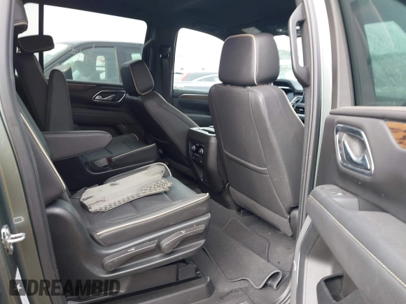 2023 Chevrolet Suburban Premier with VIN 1GNSCFKD3PR519575, listed as a IAAI auction lot 41467325 with 18,007 mi miles and . Bid and sale history available at DreamBid. Image 6.